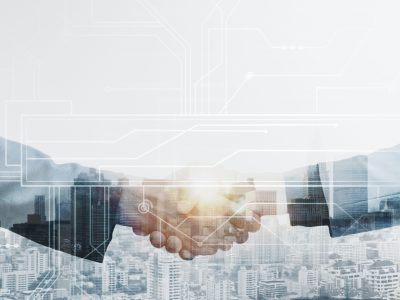 Business partners handshake global corporate with technology concept